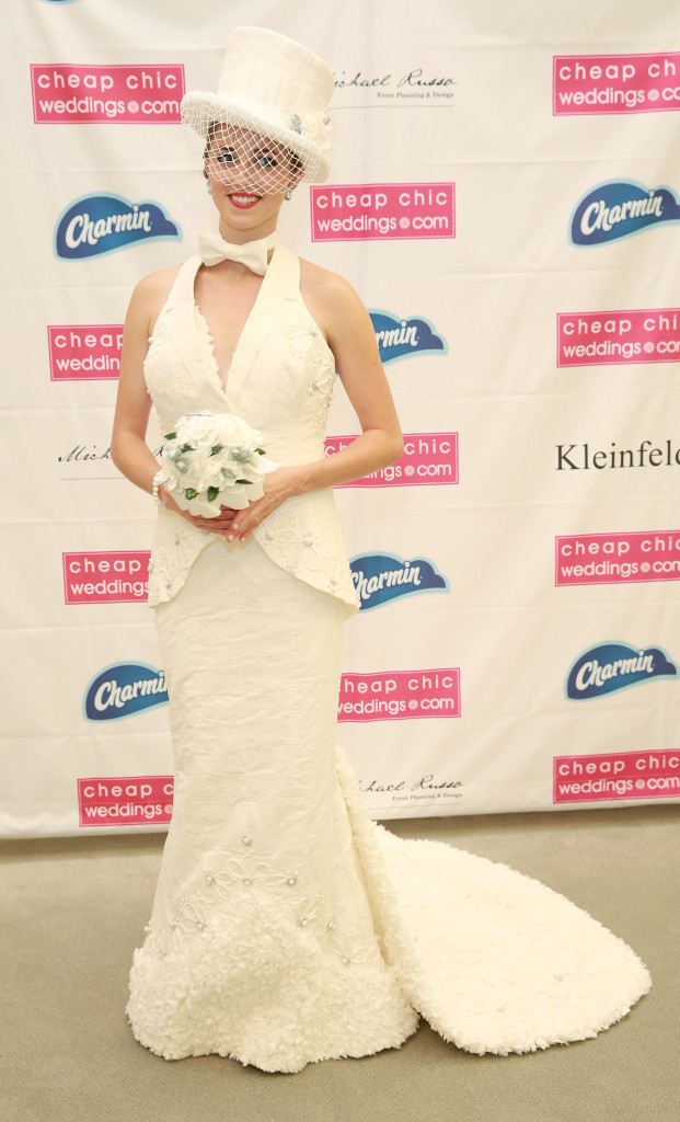 For the first time, the winning wedding dress design, shown here at the 11th Annual Toilet Paper Wedding Dress Contest presented by Cheap Chic Weddings and Charmin, will be turned into a ready-to-wear design by a Kleinfeld Bridal designer, on Wednesday, June 17, 2015 in New York. (Amy Sussman/AP Images for Charmin)